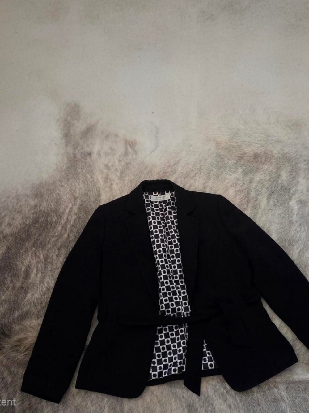 Black blazer with white geometric pattern